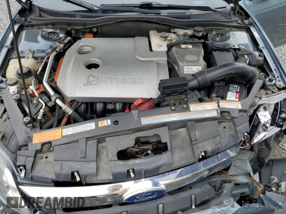 2012 Ford Fusion Hybrid с VIN 3FADP0L32CR184712, выставлен на аукционе Copart как лот 58517555 с пробегом 196 644 миль миль и Списание • Salvage title. История ставок и продаж доступна на DreamBid. Изображение 11.