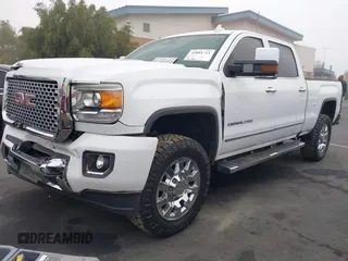 2015 GMC Sierra 2500HD Denali with VIN 1GT120E85FF681680, listed as a IAAI auction lot 42081711 with 67,676 mi miles and . Bid and sale history available at DreamBid. Image 17.