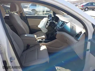 2016 Hyundai Tucson SE with VIN KM8J23A48GU127546, listed as a IAAI auction lot 41813750 with 108,107 mi miles. Bid and sale history available at carsss.com. Image 5.