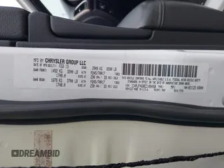 2014 Jeep Grand Cherokee Laredo with VIN 1C4RJFAG8EC109458, listed as a IAAI auction lot 41908466 with 59,427 mi miles. Bid and sale history available at carsss.com. Image 9.