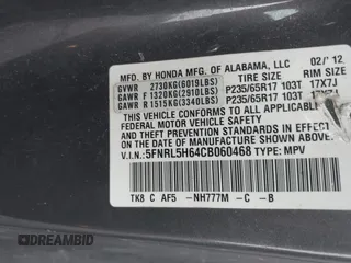 2012 Honda Odyssey EX-L with VIN 5FNRL5H64CB060468, listed as a IAAI auction lot 42182501 with 236,399 mi miles and . Bid and sale history available at carsss.com. Image 9.