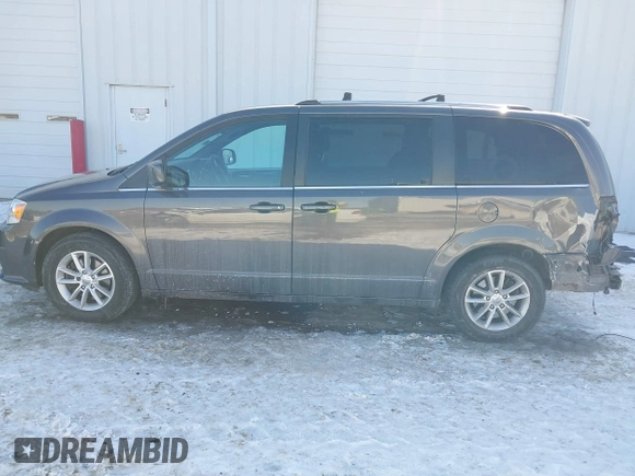 2019 Dodge Grand Caravan SXT with VIN 2C4RDGCG9KR637121, listed as a IAAI auction lot 41636355 with 177,073 mi miles and . Bid and sale history available at DreamBid. Image 15.