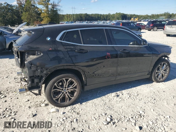 2021 BMW X2 sDrive28i with VIN WBXYH9C08M5S47984, listed as a Copart auction lot 74954164 with 70,829 mi miles and Salvage Title. Bid and sale history available at carsss.com. Image 3.