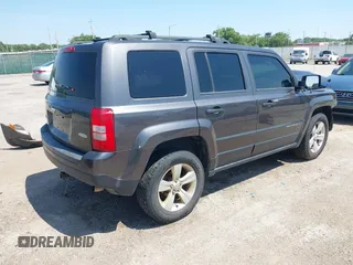2014 Jeep Patriot Latitude with VIN 1C4NJRFB4ED799037, listed as a IAAI auction lot 42458807 with 105,936 mi miles and . Bid and sale history available at DreamBid. Image 4.
