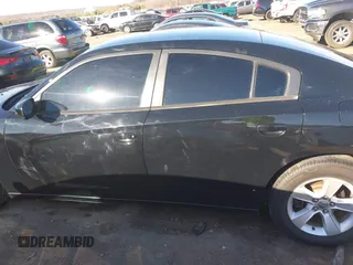 2014 Dodge Charger SE with VIN 2C3CDXBG9EH116776, listed as a IAAI auction lot 41465565 with 128,319 mi miles. Bid and sale history available at carsss.com. Image 15.