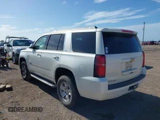 2015 Chevrolet Tahoe LT with VIN 1GNSCBKC3FR631632, listed as a IAAI auction lot 42532555 with 235,904 mi miles and . Bid and sale history available at DreamBid. Image 3.