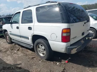 2003 Chevrolet Tahoe LT with VIN 1GNEC13Z33J145665, listed as a IAAI auction lot 41807970 with 307,997 mi miles. Bid and sale history available at carsss.com. Image 3.