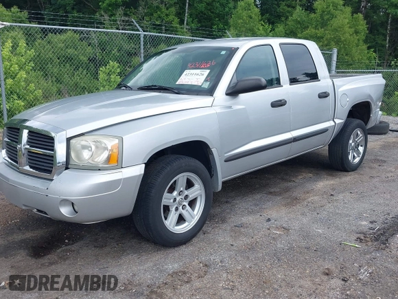 2007 Dodge Dakota SLT z VIN 1D7HE48K27S127788, wystawiony jako IAAI lot #42311626 z przebiegiem 357 130 mil mil oraz . Historia ofert i sprzedaży dostępna na DreamBid. Obrazek 2.