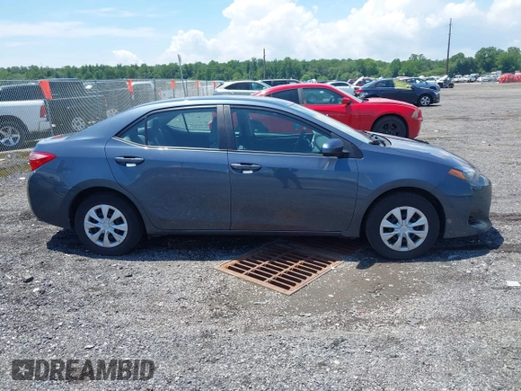 2019 Toyota Corolla L with VIN 2T1BURHE4KC195952, listed as a IAAI auction lot 42534523 with 144,238 mi miles and . Bid and sale history available at DreamBid. Image 13.