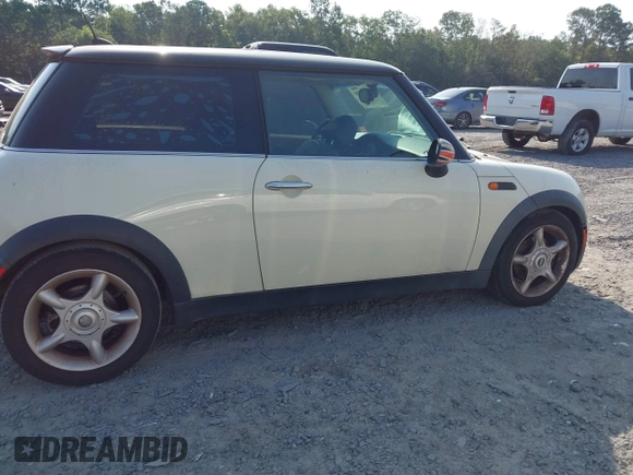 2006 MINI Hardtop with VIN WMWRC33506TK18077, listed as a IAAI auction lot 42583190 with 170,819 mi miles and . Bid and sale history available at DreamBid. Image 6.