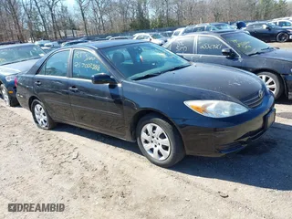 2003 Toyota Camry LE with VIN 4T1BE32K93U134041, listed as a IAAI auction lot 41834634 with 999,999 mi miles. Bid and sale history available at carsss.com. Image 1.
