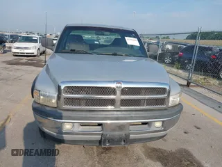 1998 Dodge 1500 z VIN 1B7HC13Y7WJ121175, wystawiony jako IAAI lot #42380600 z przebiegiem 108 539 mil mil oraz . Historia ofert i sprzedaży dostępna na DreamBid. Obrazek 13.