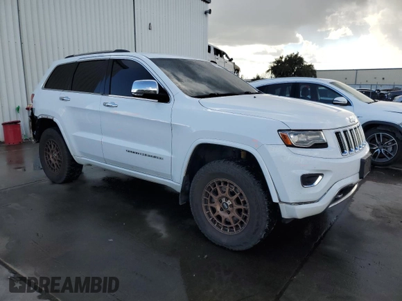 2014 Jeep Grand Cherokee Overland with VIN 1C4RJFCT6EC247798, listed as a Copart auction lot 48344975 with 172,253 mi miles and Salvage Title. Bid and sale history available at DreamBid. Image 4.