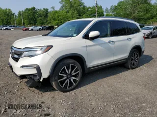 2019 Honda Pilot Elite with VIN 5FNYF6H09KB041935, listed as a Copart auction lot 60530515 with 57,526 mi miles and Salvage title. Bid and sale history available at DreamBid. Image 1.