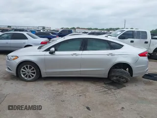 2017 Ford Fusion SE with VIN 3FA6P0HD3HR273593, listed as a IAAI auction lot 42136079 with 101,545 mi miles and . Bid and sale history available at DreamBid. Image 14.