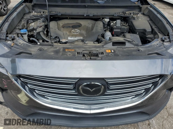 2019 Mazda CX-9 Touring with VIN JM3TCACY6K0334121, listed as a Copart auction lot 64901735 with 112,328 mi miles and Salvage title. Bid and sale history available at DreamBid. Image 11.