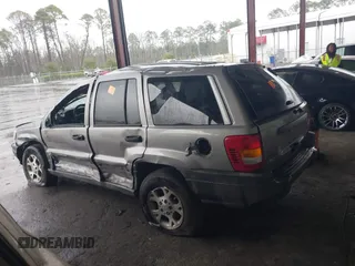 2001 Jeep Grand Cherokee Laredo with VIN 1J4GX48S51C708990, listed as a IAAI auction lot 41656323 with 198,124 mi miles and . Bid and sale history available at DreamBid. Image 13.