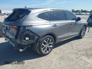 2022 Acura MDX Technology with VIN 5J8YD9H41NL006271, listed as a IAAI auction lot 42602014 with 59,338 mi miles and . Bid and sale history available at DreamBid. Image 4.