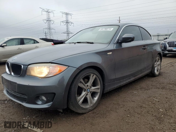2013 BMW 1 Series 128i with VIN WBAUP7C59DVP24160, listed as a Copart auction lot 84736514 with 91,820 mi miles and Salvage Title. Bid and sale history available at carsss.com. Image 1.