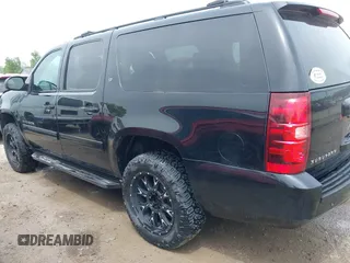 2012 Chevrolet Suburban LT with VIN 1GNSKJE75CR189265, listed as a IAAI auction lot 42270178 with 171,219 mi miles and . Bid and sale history available at DreamBid. Image 14.