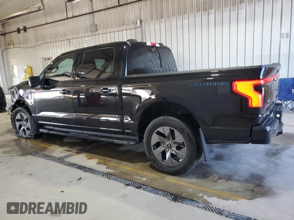 2023 Ford F-150 Lightning Pro z VIN 1FTVW1EV0PWG06971, wystawiony jako Copart lot #61850635 z przebiegiem 32 388 mil mil oraz Szkoda całkowita • Salvage title. Historia ofert i sprzedaży dostępna na DreamBid. Obrazek 2.