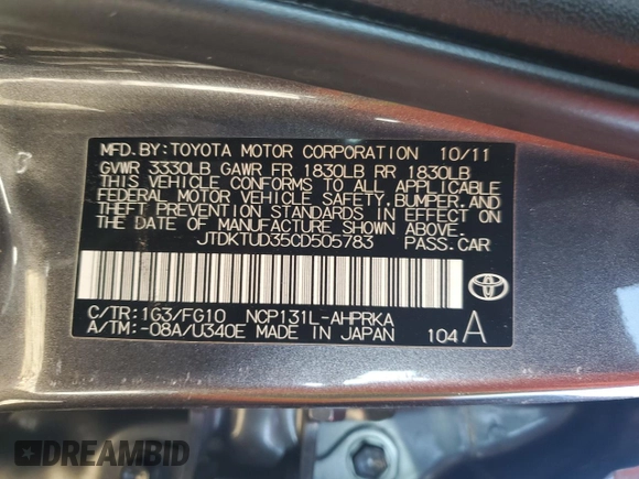 2012 Toyota Yaris L z VIN JTDKTUD35CD505783, wystawiony jako Copart lot #42017425 z przebiegiem 182 875 mil mil oraz Szkoda całkowita • Salvage title. Historia ofert i sprzedaży dostępna na DreamBid. Obrazek 12.