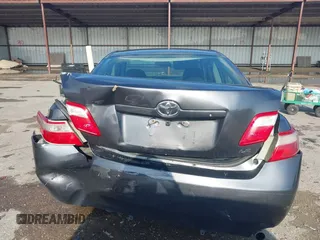 2007 Toyota Camry CE z VIN 4T1BE46K97U057970, wystawiony jako IAAI lot #42183422 z przebiegiem 145 791 mil mil oraz . Historia ofert i sprzedaży dostępna na DreamBid. Obrazek 16.