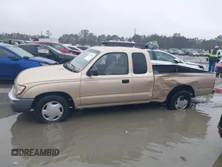 1999 Toyota Tacoma with VIN 4TAVL52N4XZ524059, listed as a IAAI auction lot 41761806 with 214,425 mi miles and . Bid and sale history available at DreamBid. Image 14.
