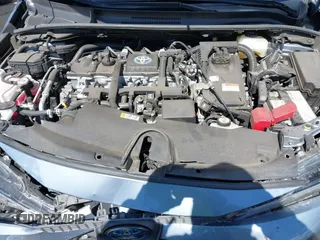 2021 Toyota Corolla Hybrid LE with VIN JTDEAMDE0MJ026601, listed as a IAAI auction lot 41797452 with 85,294 mi miles. Bid and sale history available at carsss.com. Image 10.