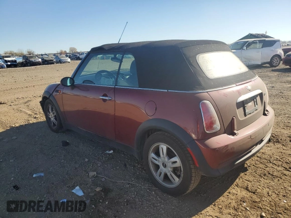 2007 MINI Convertible with VIN WMWRF33557TG17353, listed as a Copart auction lot 78946104 with 98,362 mi miles and Salvage Title. Bid and sale history available at DreamBid. Image 2.