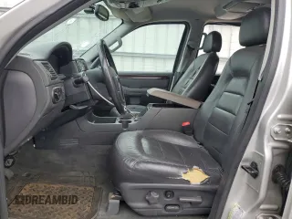 2004 Ford Explorer Limited z VIN 1FMDU75W94ZA68418, wystawiony jako Copart lot #65062085 z przebiegiem 157 972 mil mil oraz Szkoda całkowita • Salvage title. Historia ofert i sprzedaży dostępna na DreamBid. Obrazek 7.