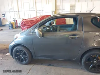 2012 Scion iQ with VIN JTNJJXB02CJ009171, listed as a IAAI auction lot 41425041 with 117,714 mi miles. Bid and sale history available at carsss.com. Image 6.