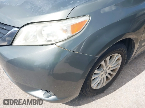 2014 Toyota Sienna XLE with VIN 5TDYK3DC2ES448876, listed as a IAAI auction lot 42519351 with 154,601 mi miles and . Bid and sale history available at DreamBid. Image 6.