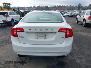 2015 Volvo S60 T5 Drive-E Premier with VIN YV126MFK4F2349564, listed as a IAAI auction lot 41711836 with 59,897 mi miles. Bid and sale history available at carsss.com. Image 16.