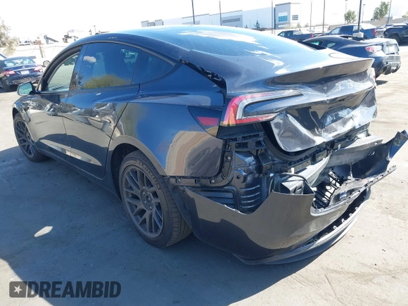 2024 Tesla Model 3 with VIN 5YJ3E1EA9RF849936, listed as a IAAI auction lot 41707656 with 18,749 mi miles and . Bid and sale history available at DreamBid. Image 3.