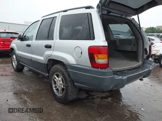 2004 Jeep Grand Cherokee Laredo z VIN 1J4GW48S64C132172, wystawiony jako IAAI lot #42163524 z przebiegiem 170 952 mil mil oraz . Historia ofert i sprzedaży dostępna na DreamBid. Obrazek 3.