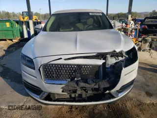 2020 Lincoln Nautilus Standard z VIN 2LMPJ6J93LBL21920, wystawiony jako Copart lot #88324745 z przebiegiem 63 402 mil mil oraz Szkoda całkowita • Salvage title. Historia ofert i sprzedaży dostępna na DreamBid. Obrazek 5.