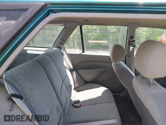 1997 Ford Escort LX with VIN 3FALP15P5VR126145, listed as a IAAI auction lot 42637921 with 148,109 mi miles and . Bid and sale history available at DreamBid. Image 8.