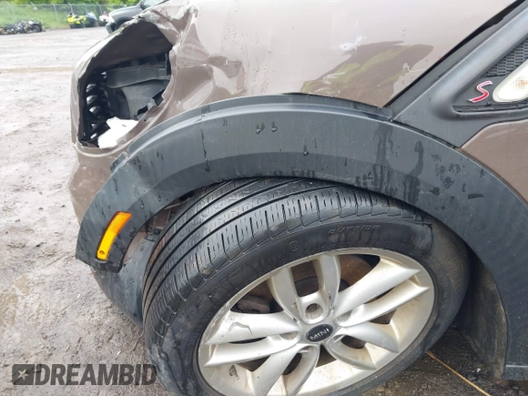 2014 MINI Countryman S with VIN WMWZC5C54EWM17898, listed as a IAAI auction lot 42343469 with 112,773 mi miles and . Bid and sale history available at DreamBid. Image 12.