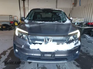2021 Honda Pilot EX-L with VIN 5FNYF6H56MB037761, listed as a IAAI auction lot 41154468 with 61,159 mi miles. Bid and sale history available at carsss.com. Image 12.