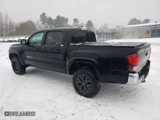 2023 Toyota Tacoma 4WD SR with VIN 3TYCZ5AN3PT149184, listed as a Copart auction lot 42582075 with 76,365 mi miles and Salvage Title. Bid and sale history available at carsss.com. Image 2.