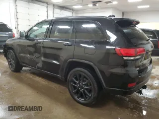2021 Jeep Grand Cherokee Laredo X with VIN 1C4RJFAG0MC535661, listed as a Copart auction lot 57431135 with 101,314 mi miles and Salvage title. Bid and sale history available at DreamBid. Image 2.