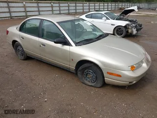 2000 Saturn SL with VIN 1G8ZH5287YZ262924, listed as a IAAI auction lot 42068691 with 161,975 mi miles. Bid and sale history available at carsss.com. Image 1.