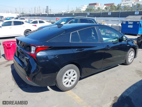 2022 Toyota Prius L Eco with VIN JTDKAMFU3N3165036, listed as a IAAI auction lot 41657575 with 44,099 mi miles. Bid and sale history available at carsss.com. Image 4.