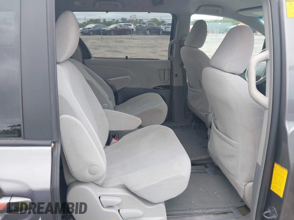 2014 Toyota Sienna LE AAS with VIN 5TDKK3DC9ES448461, listed as a IAAI auction lot 41986724 with 102,930 mi miles and . Bid and sale history available at carsss.com. Image 8.
