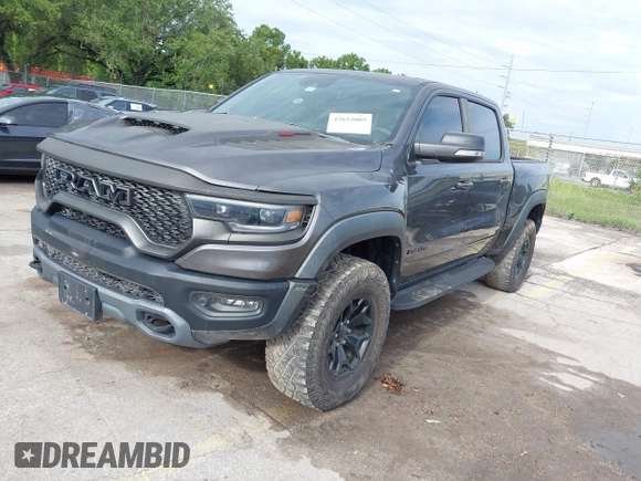 2021 Ram 1500 TRX with VIN 1C6SRFU98MN820577, listed as a IAAI auction lot 42652005 with 43,429 mi miles and . Bid and sale history available at DreamBid. Image 2.