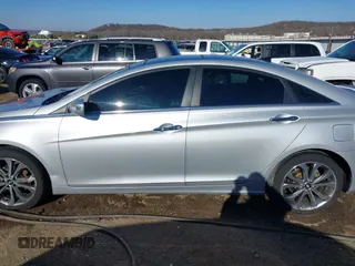 2013 Hyundai Sonata Limited with VIN 5NPEC4AB8DH805564, listed as a IAAI auction lot 41133553 with 99,410 mi miles and . Bid and sale history available at DreamBid. Image 14.