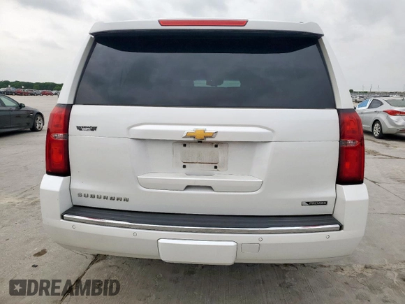 2018 Chevrolet Suburban Premier with VIN 1GNSCJKC5JR184384, listed as a Copart auction lot 53512255 with 161,503 mi miles and Salvage title. Bid and sale history available at DreamBid. Image 6.