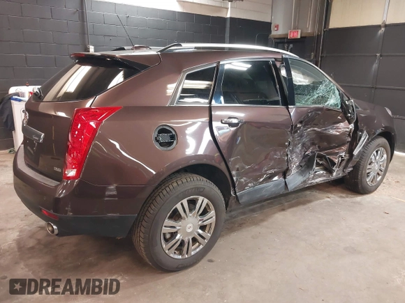 2015 Cadillac SRX Luxury Collection with VIN 3GYFNEE3XFS529754, listed as a IAAI auction lot 41727672 with 52,331 mi miles. Bid and sale history available at carsss.com. Image 4.