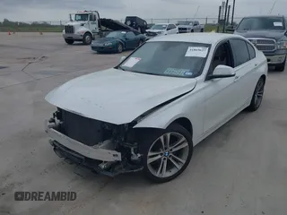 2017 BMW 3 Series 330i with VIN WBA8B9G51HNU09431, listed as a IAAI auction lot 41869627 with 87,719 mi miles. Bid and sale history available at carsss.com. Image 6.